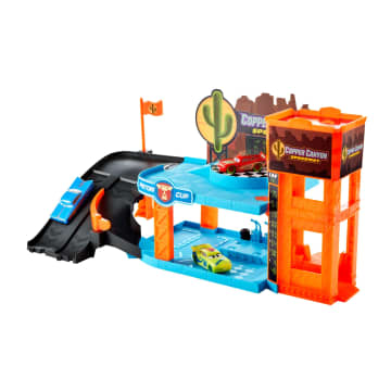 Conjunto De Juego Taller Brillante En Cañón Del Cobre De Glow Racers De Disney Pixar Cars, Incluye Tres Vehículos A Escala 1:55 Que Brillan En La Oscuridad - Imagen 1 de 4