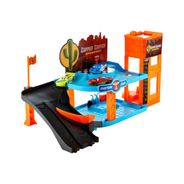 Conjunto De Juego Taller Brillante En Cañón Del Cobre De Glow Racers De Disney Pixar Cars, Incluye Tres Vehículos A Escala 1:55 Que Brillan En La Oscuridad - Imagen 2 de 4