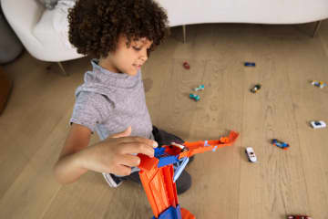 Hot Wheels City Speed Drop Transport Hauler, includes 1 Car - Image 1 of 5