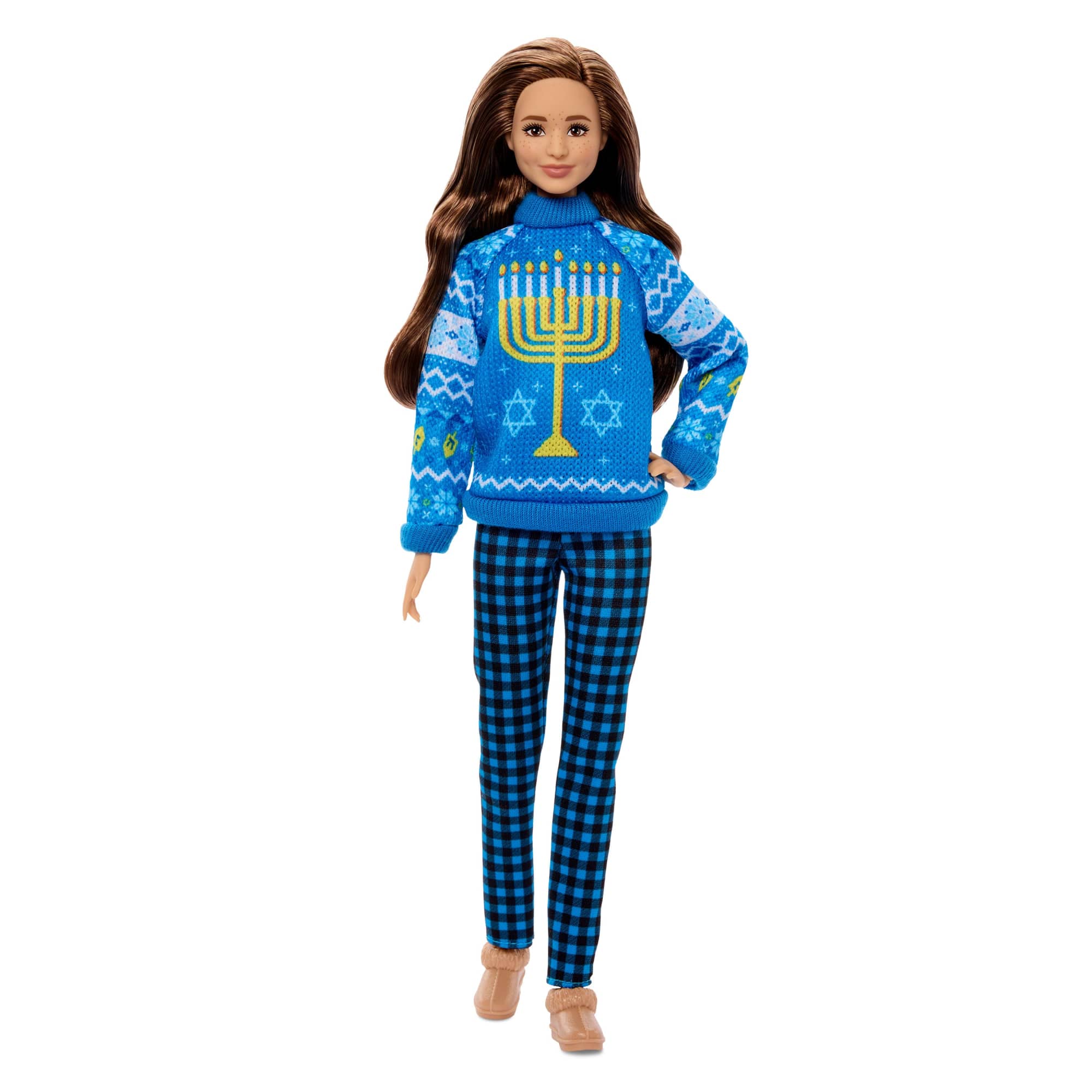 Brunette Barbie Holiday Sweater doll wearing a Hanukkah menorah sweater, blue gingham pants and winter boots