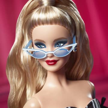Muñeca coleccionable Barbie Signature del 65.º aniversario con pelo rubio y vestido blanco y negro