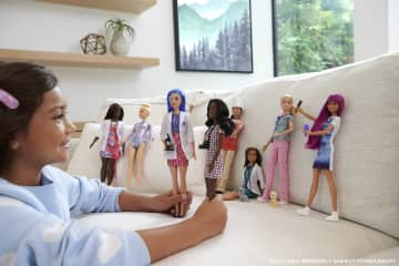 Barbie Fotógrafa de mascotas Muñeca