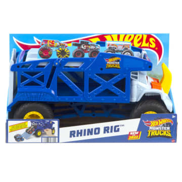 Hot Wheels Monster Trucks Rino Camión de transporte de coches de juguete con pista