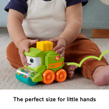 Fisher-Price Rollin’ Tractor Push-Along Toy Vehicle For infants With Fine Motor Activities - Image 5 of 6