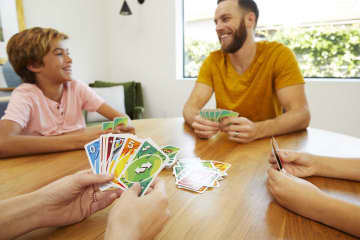 UNO Nothin’ But Paper Family Card Game With 112 Cards For 7 Year Olds & Up