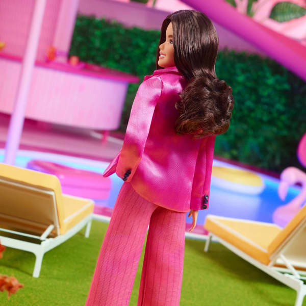 Gloria Doll Wearing Pink Power Pantsuit – Barbie The Movie