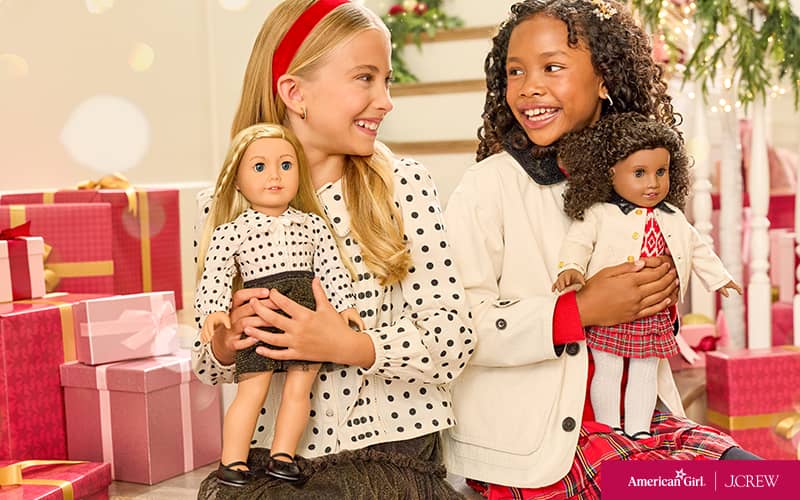 Two girls with their dolls in matching J.Crew outfits
