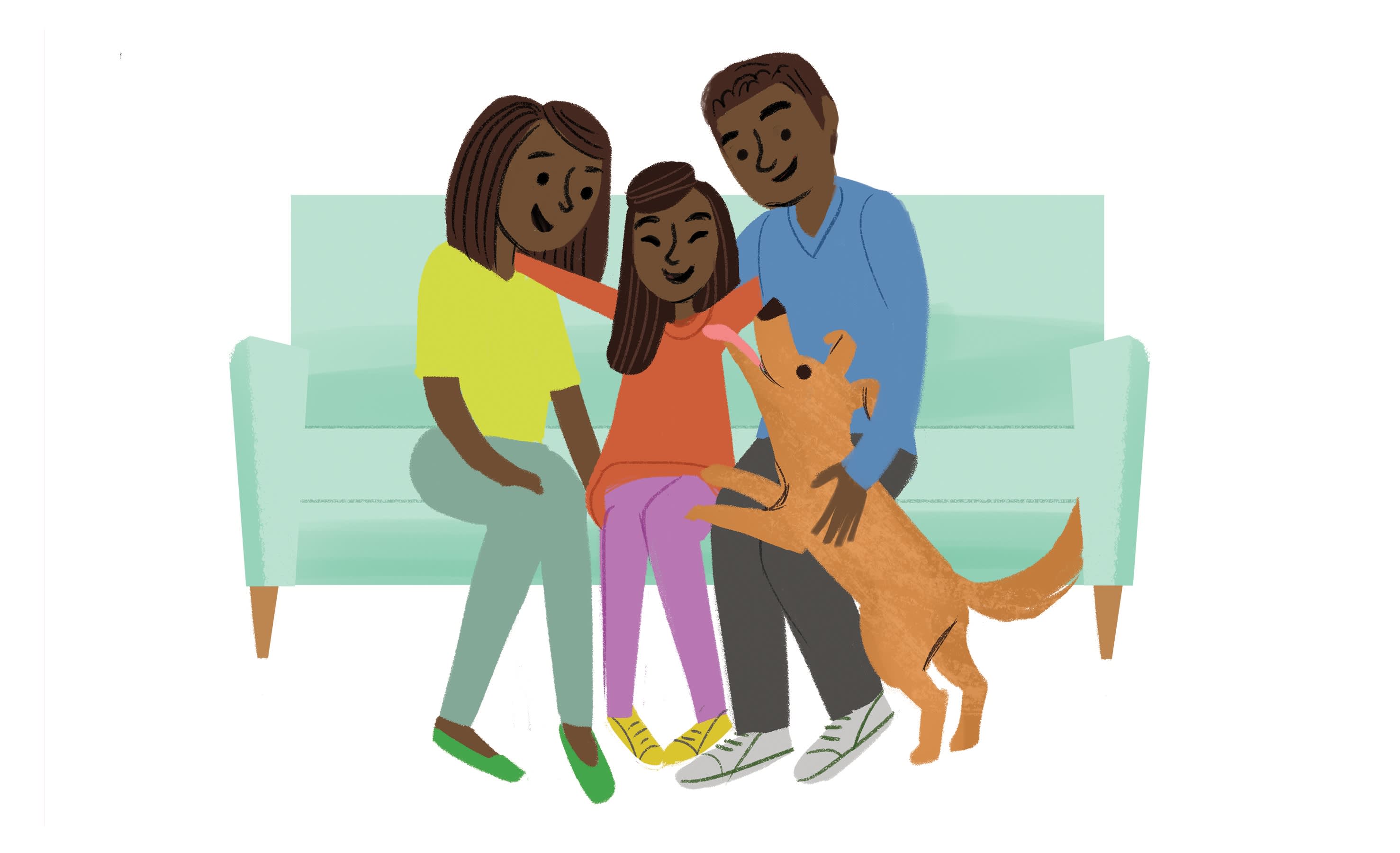 Family sitting together on a couch with their dog