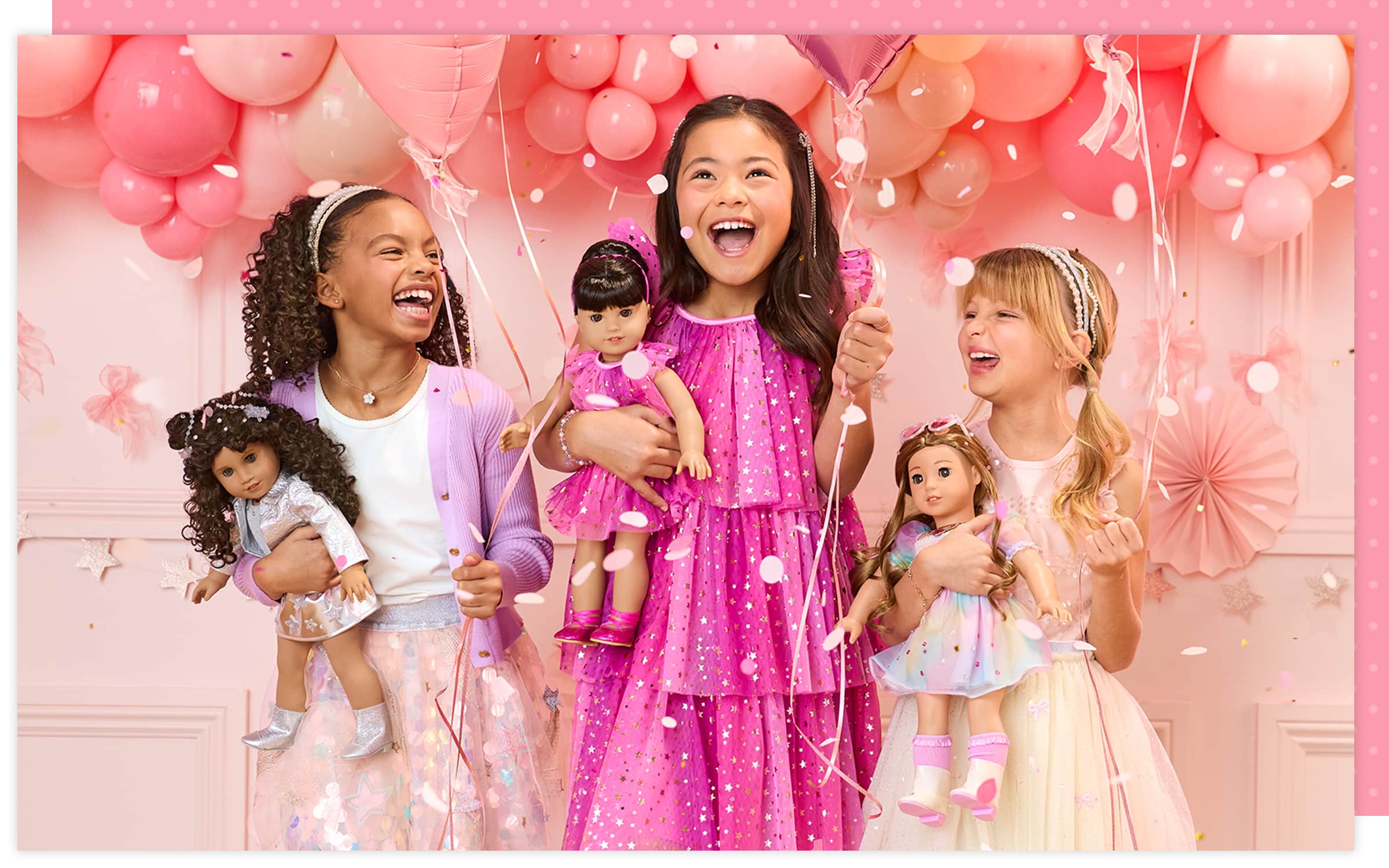 Three girls celebrating a birthday with their dolls surrounded by pink balloons