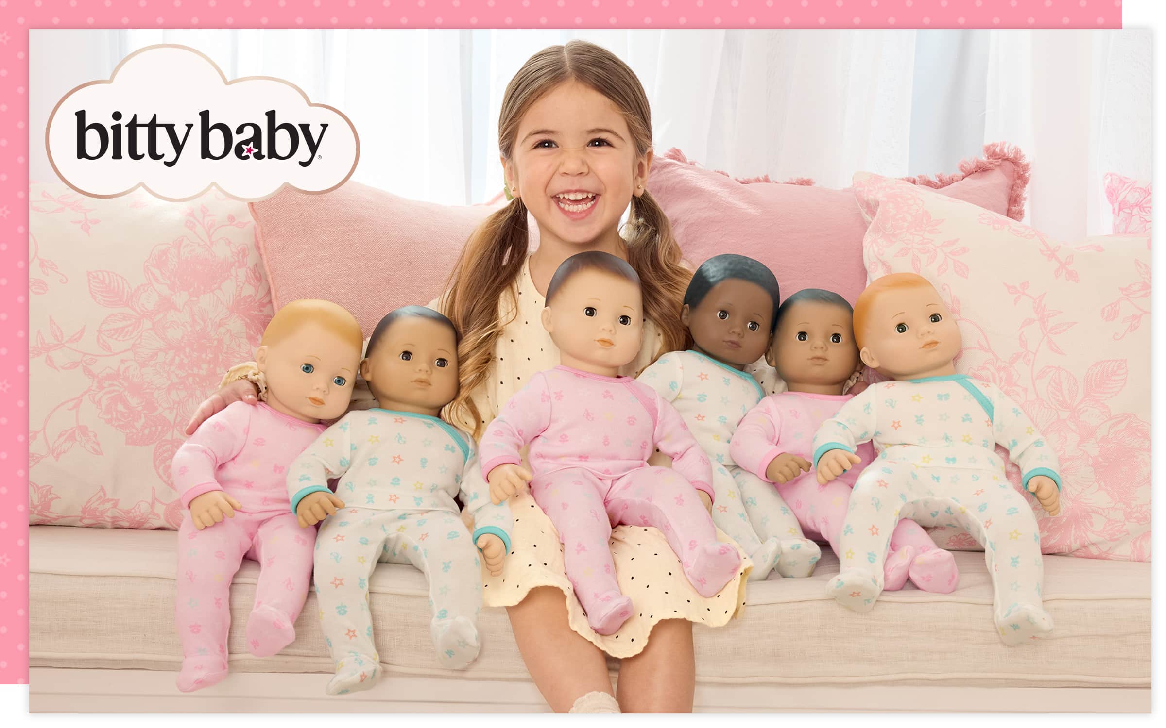 Young girl with six Bitty Babies