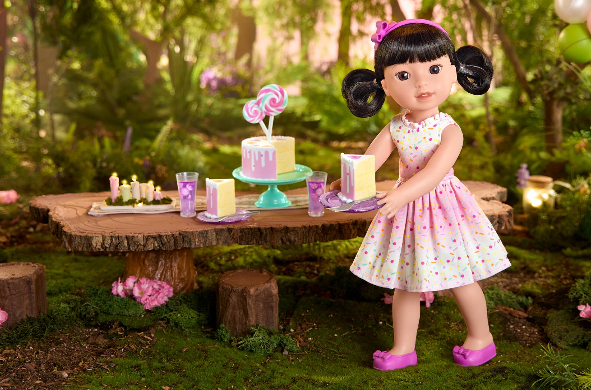 WellieWisher doll in forest with birthday cake