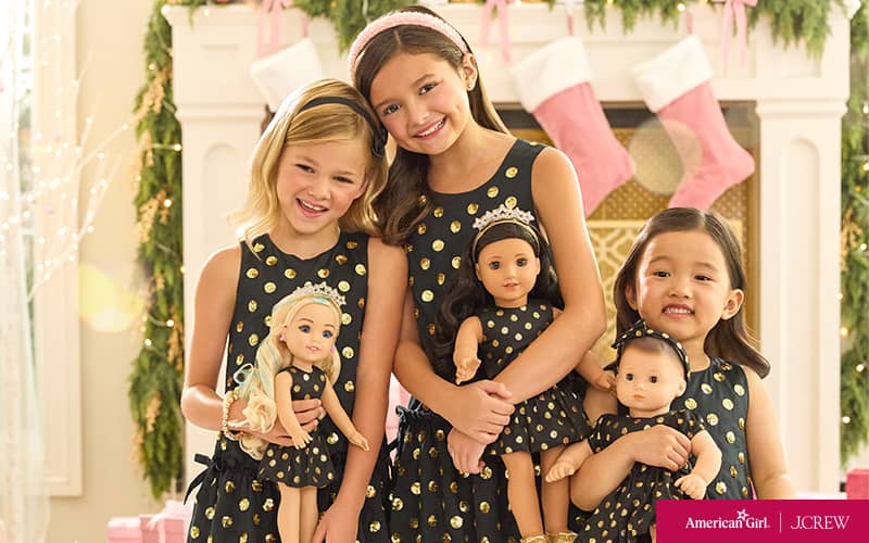 Three girls in J.Crew matching outfits with their dolls