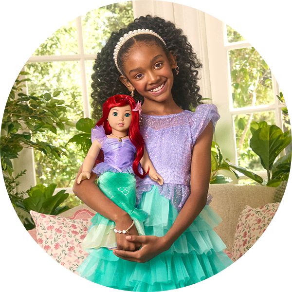 Girl and doll in matching Ariel outfit