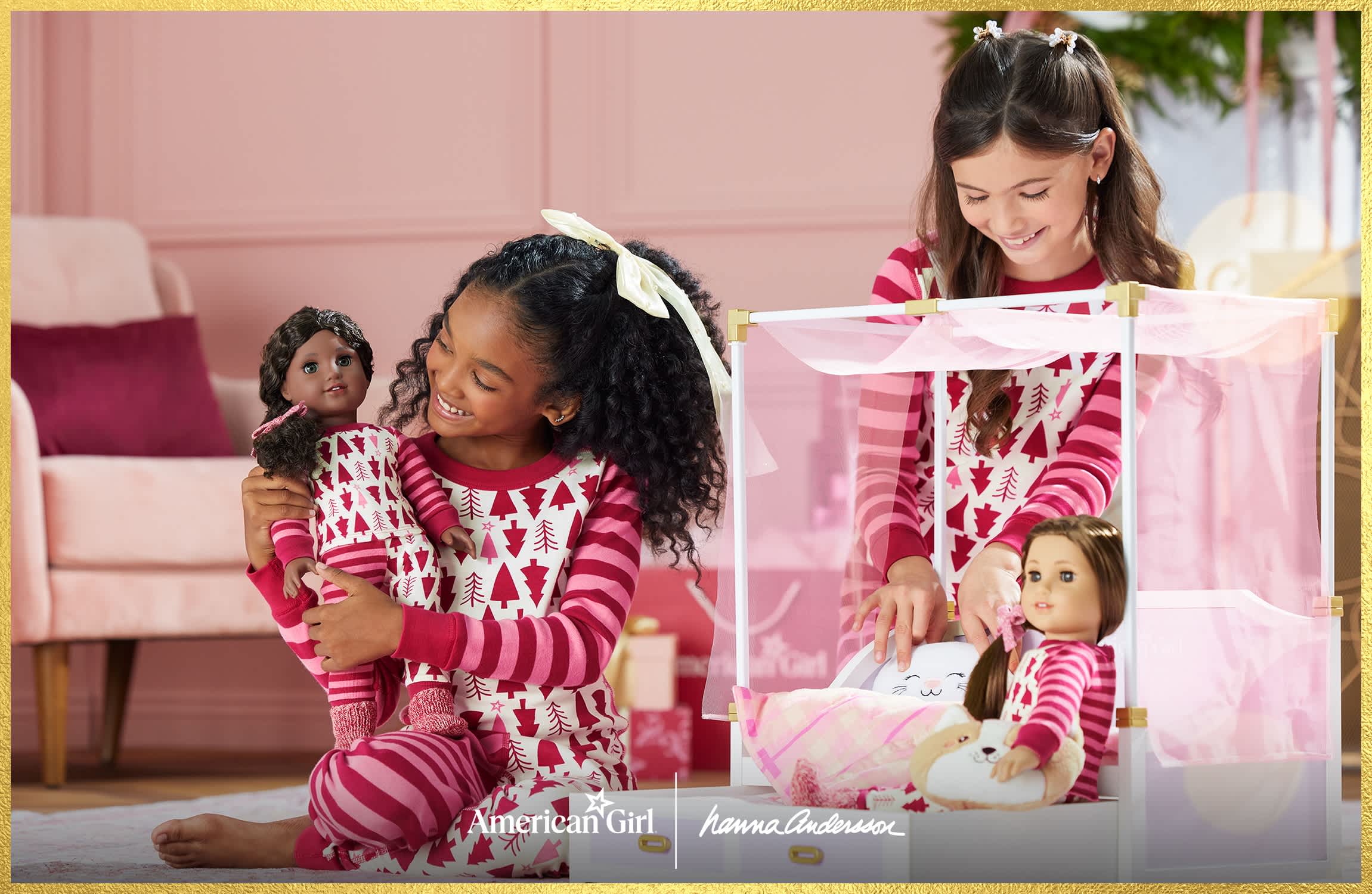 Girls and dolls wearing matching holiday pajamas