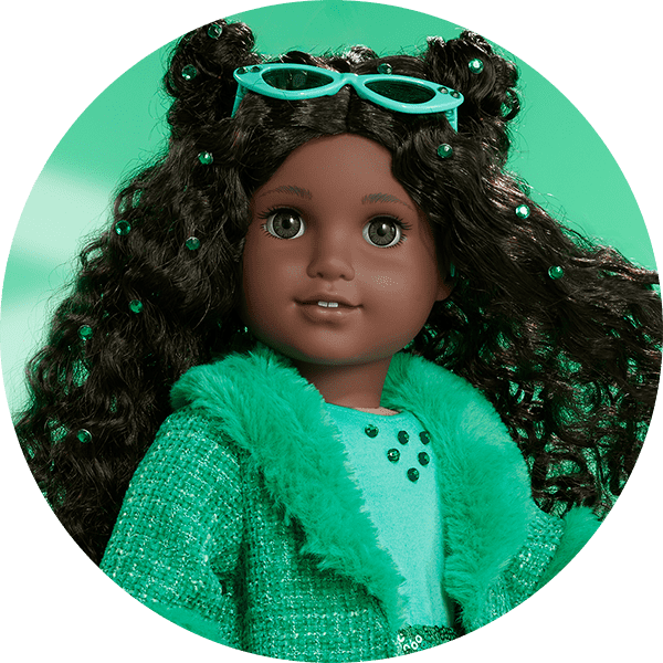 Doll in a May Emerald outfit