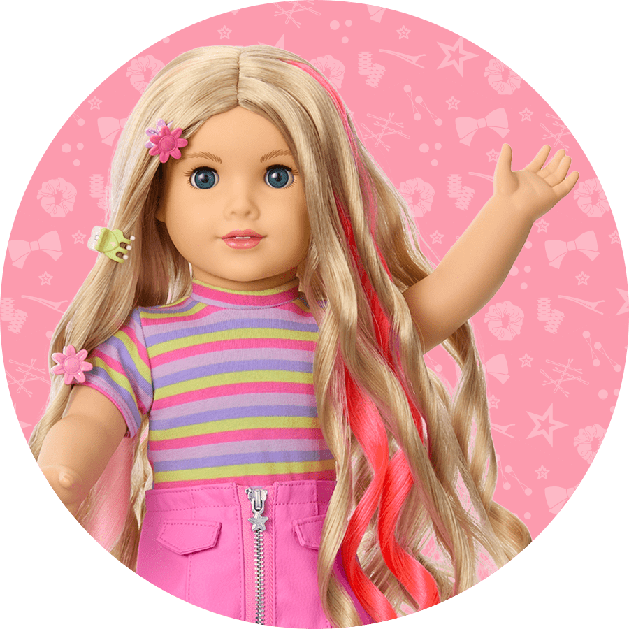Doll in spring colors outfit with pink hair highlights and pink and yellow hairclips