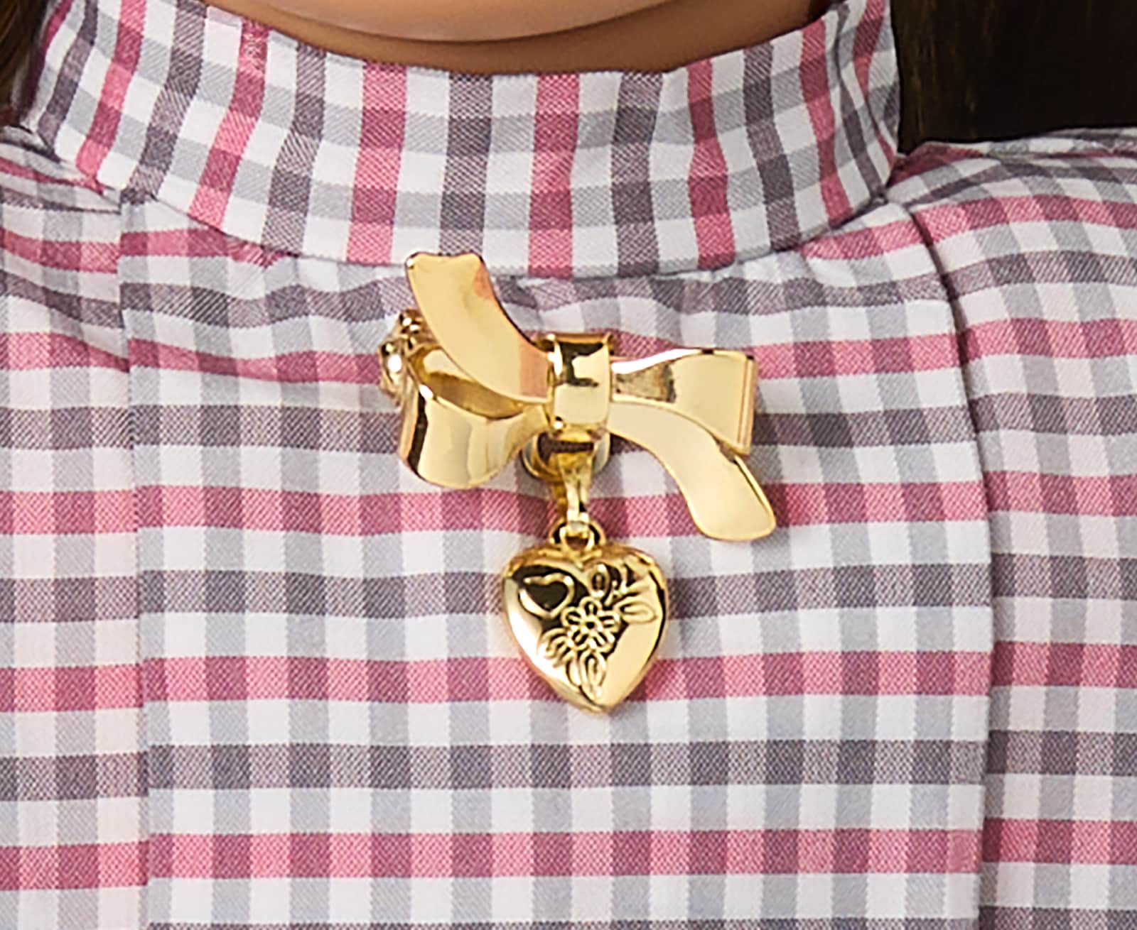 Image of Samantha Parkington's gold heart-shaped locket