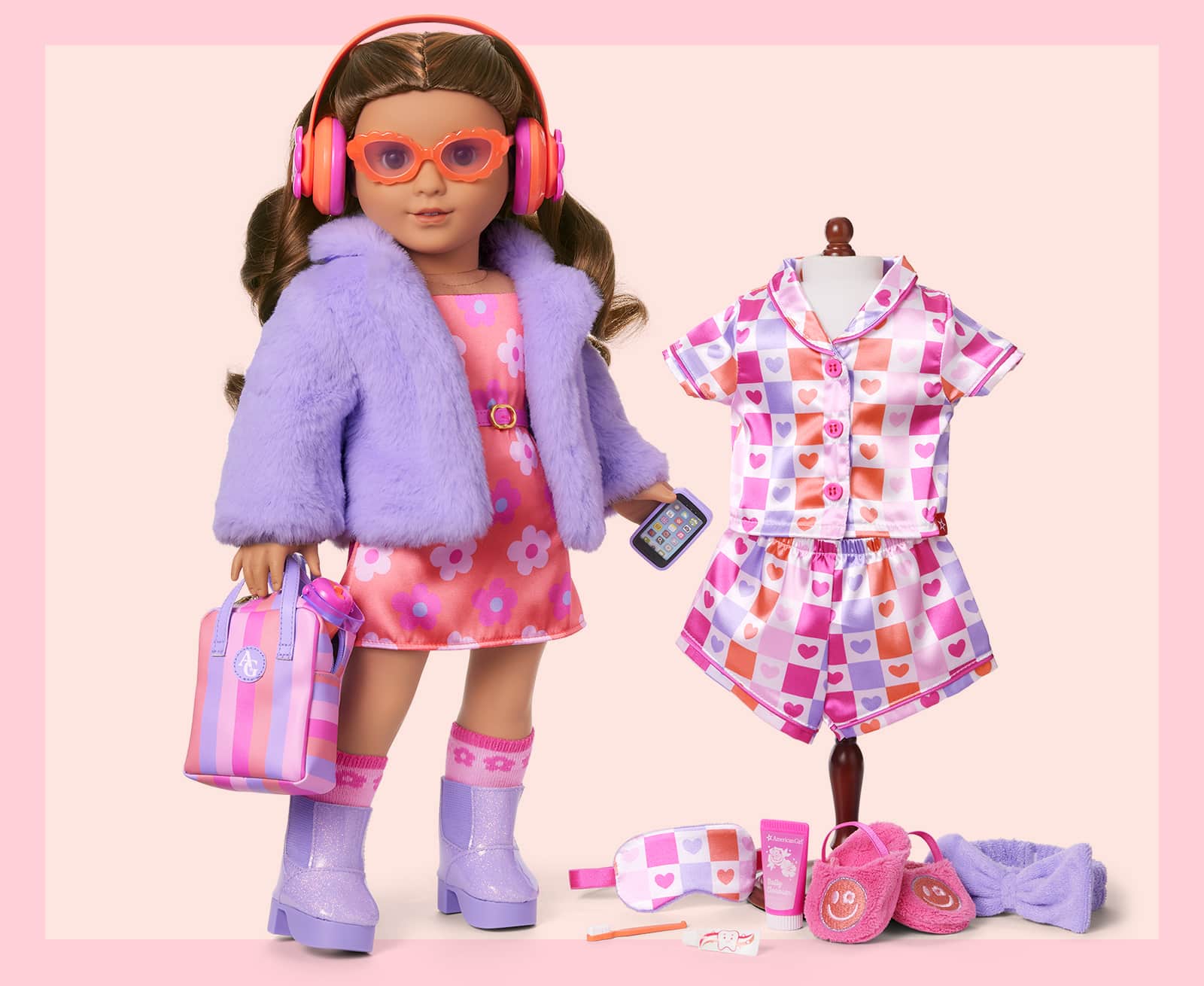 Doll standing next to pajama set