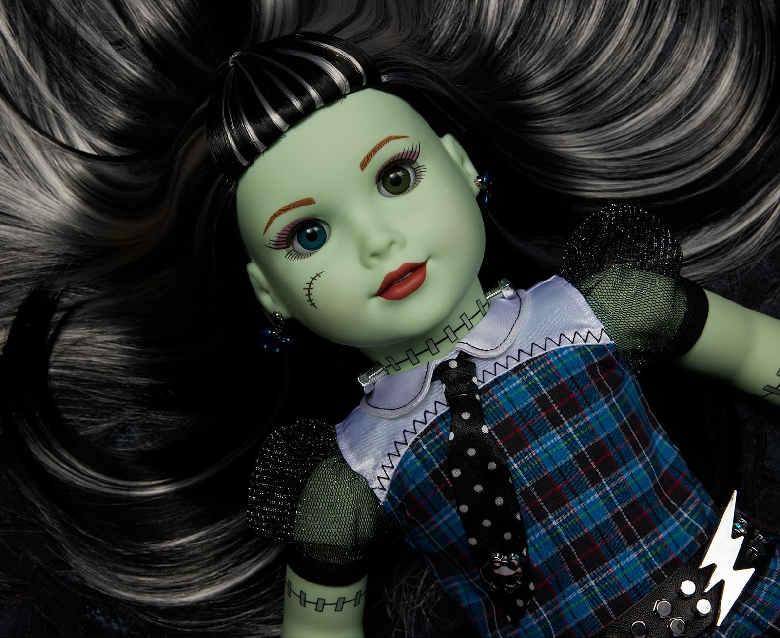 Image of Alice doll laying down