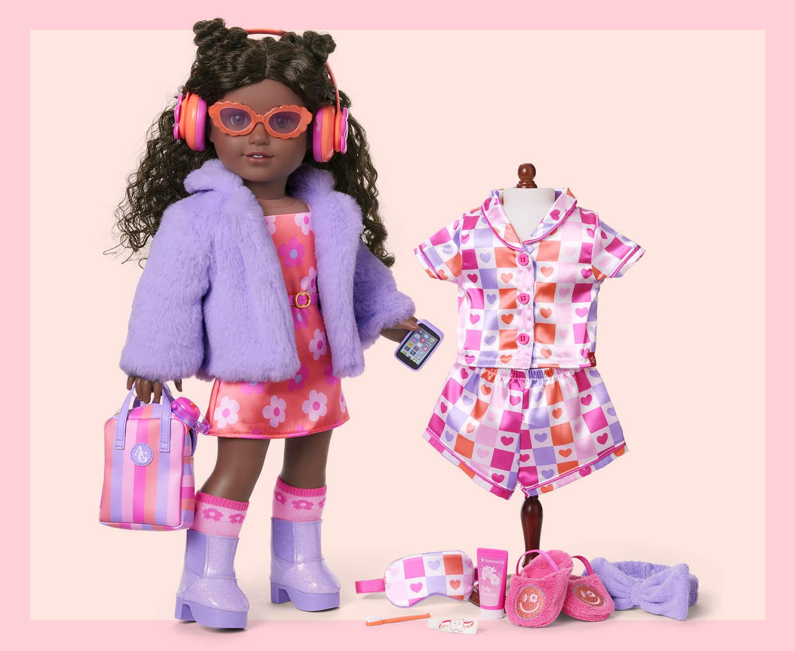 Doll standing next to pajama set