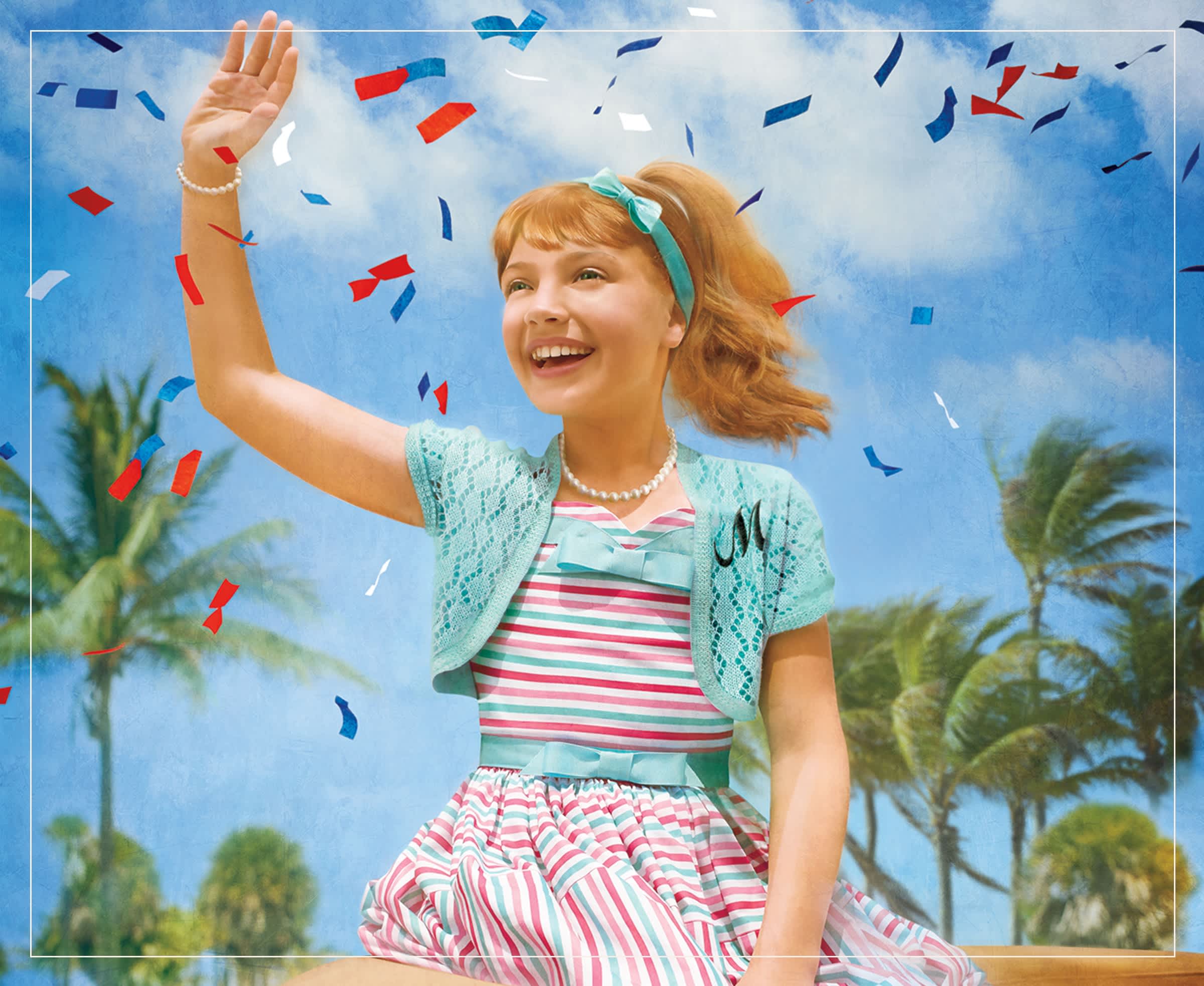Maryellen Larkin waving to a crowd