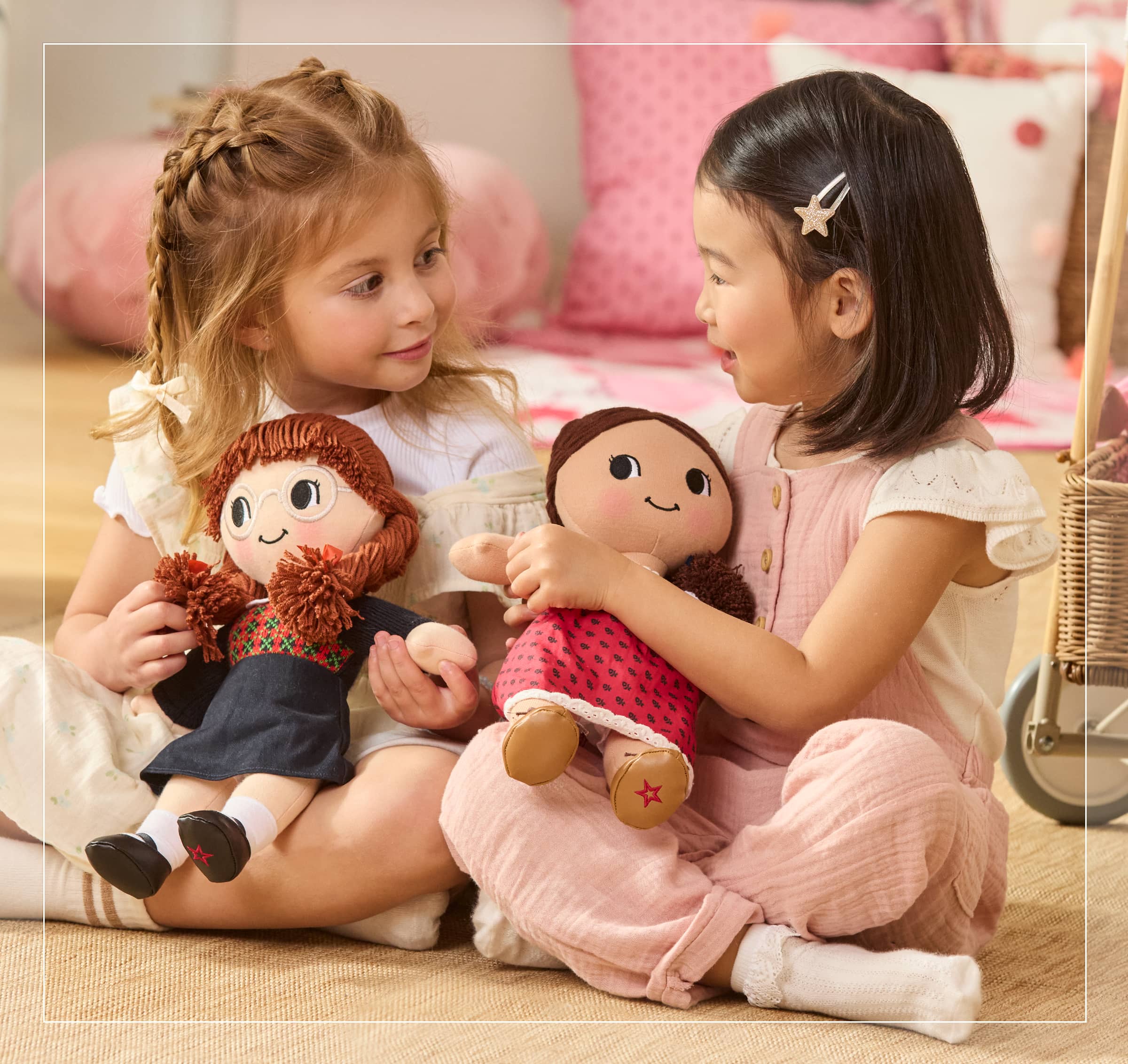 Girl holding Josefina Montoya plush doll