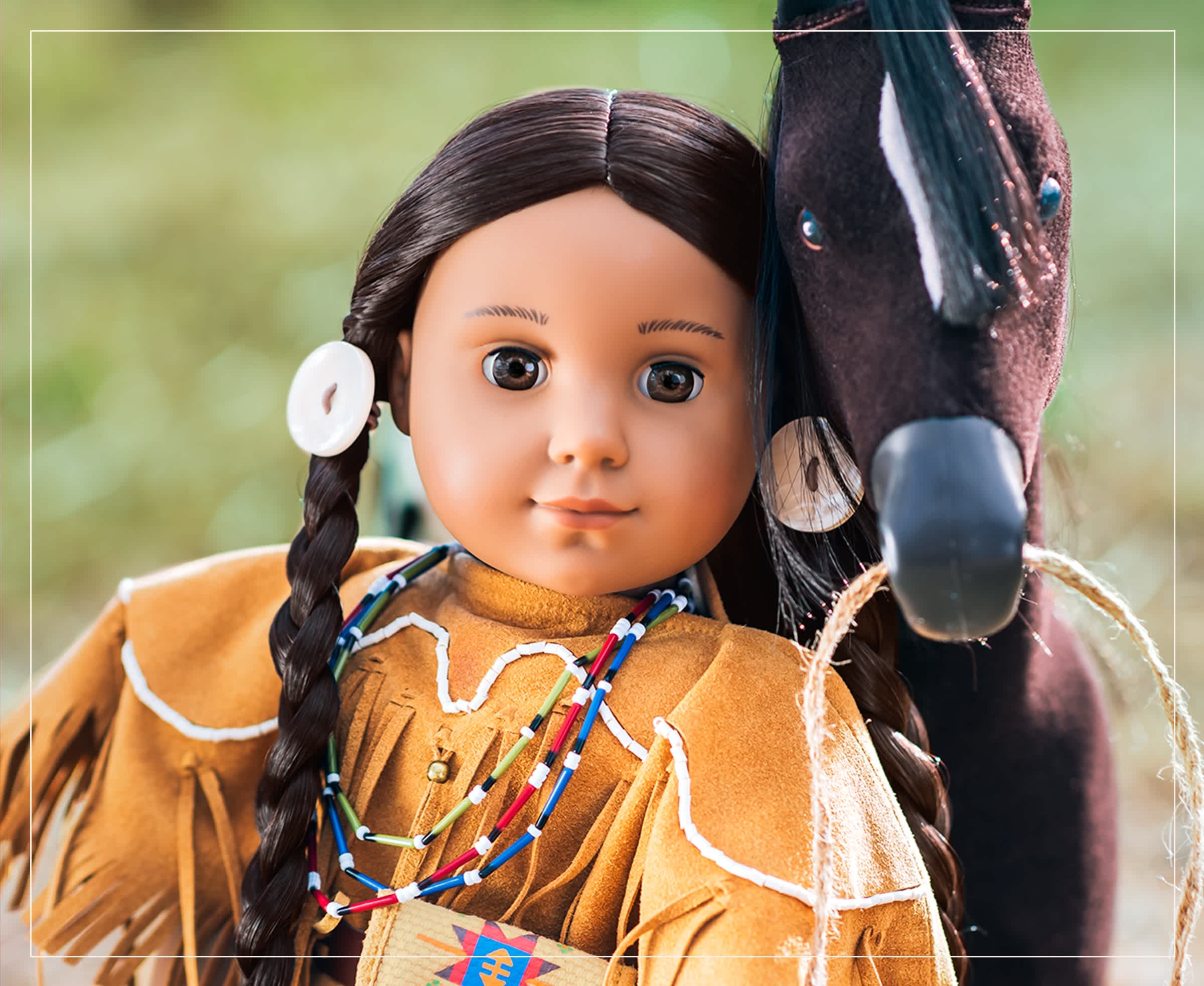 Kaya doll leaning against her horse