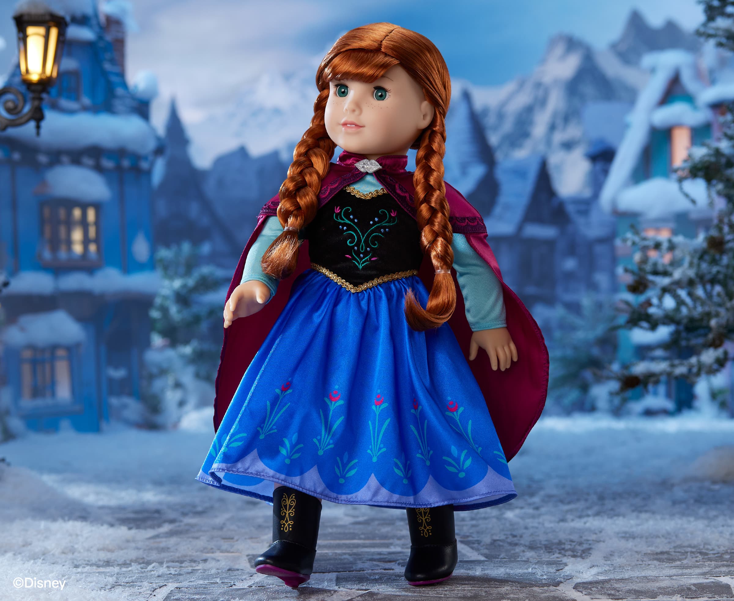 Anna doll standing and wearing her signature dress