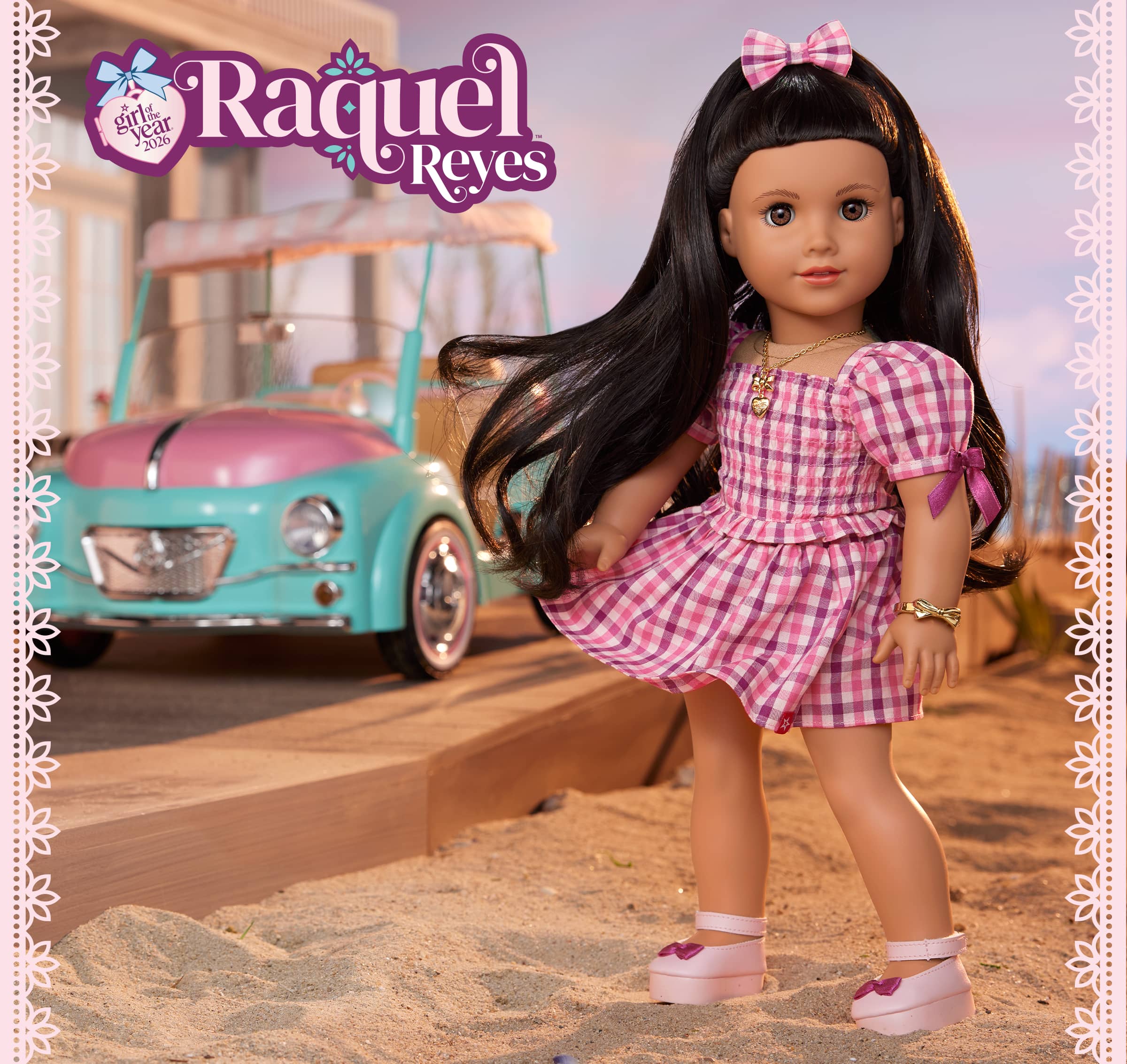 Raquel Reyes standing on the beach with her blue car