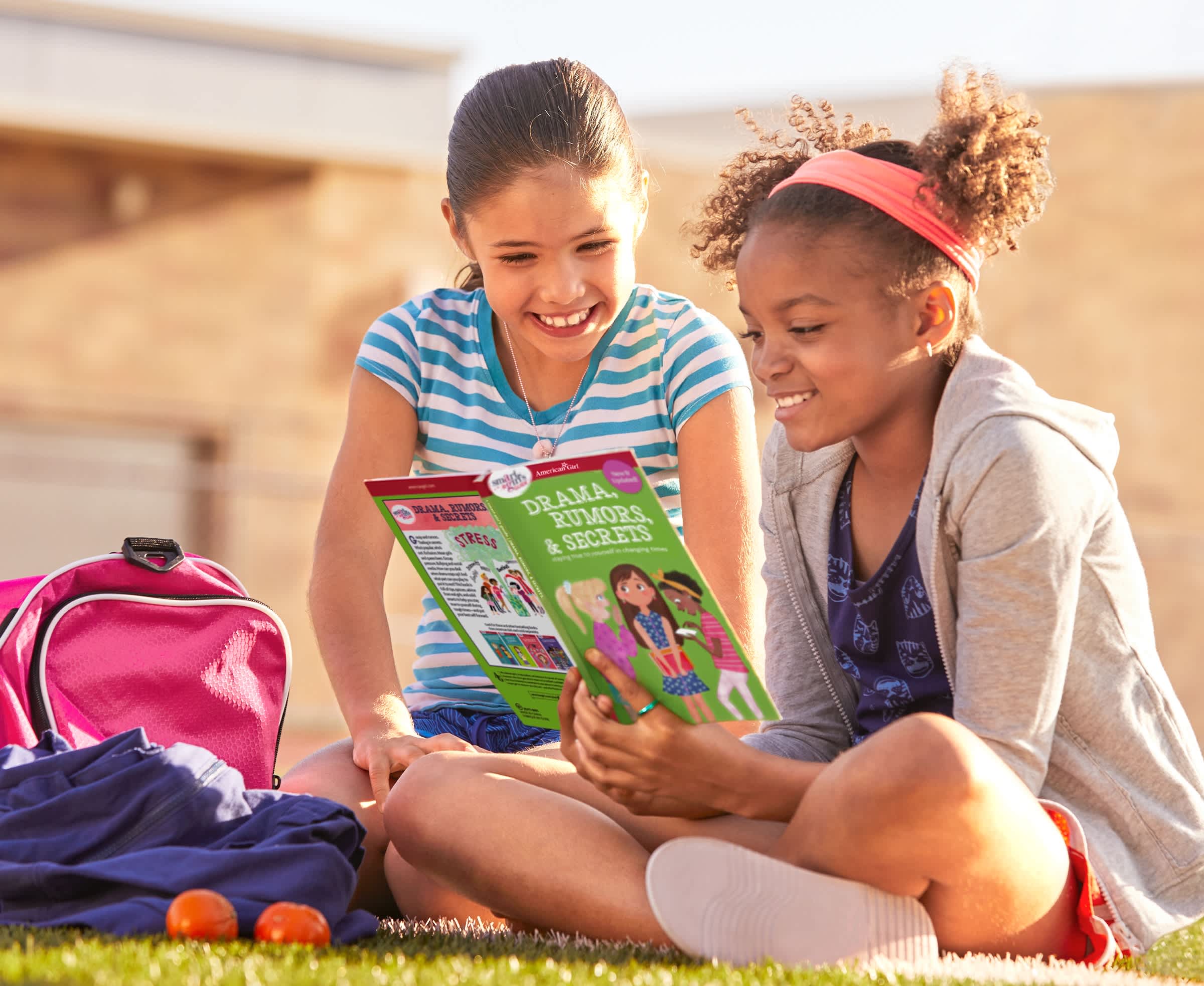 Girls reading Smart Girl's Guide: Drama, Rumors, & Secrets