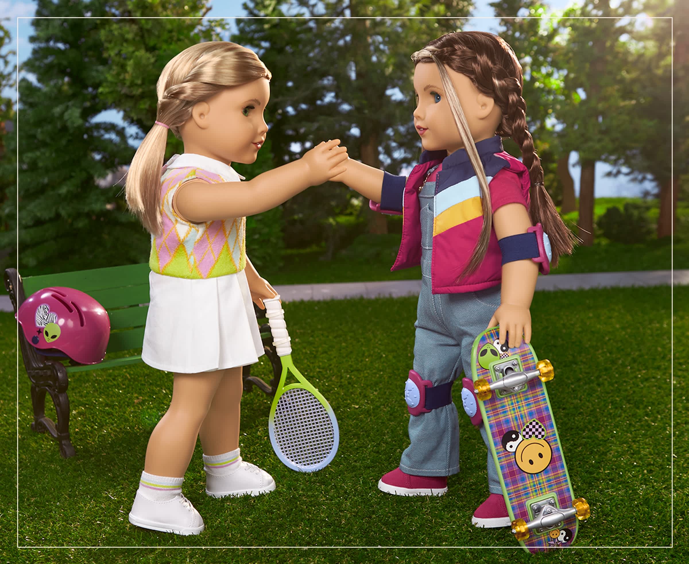 Isabel Hoffman doll standing with a tennis racquet and Nicki Hoffman doll standing with a skateboard
