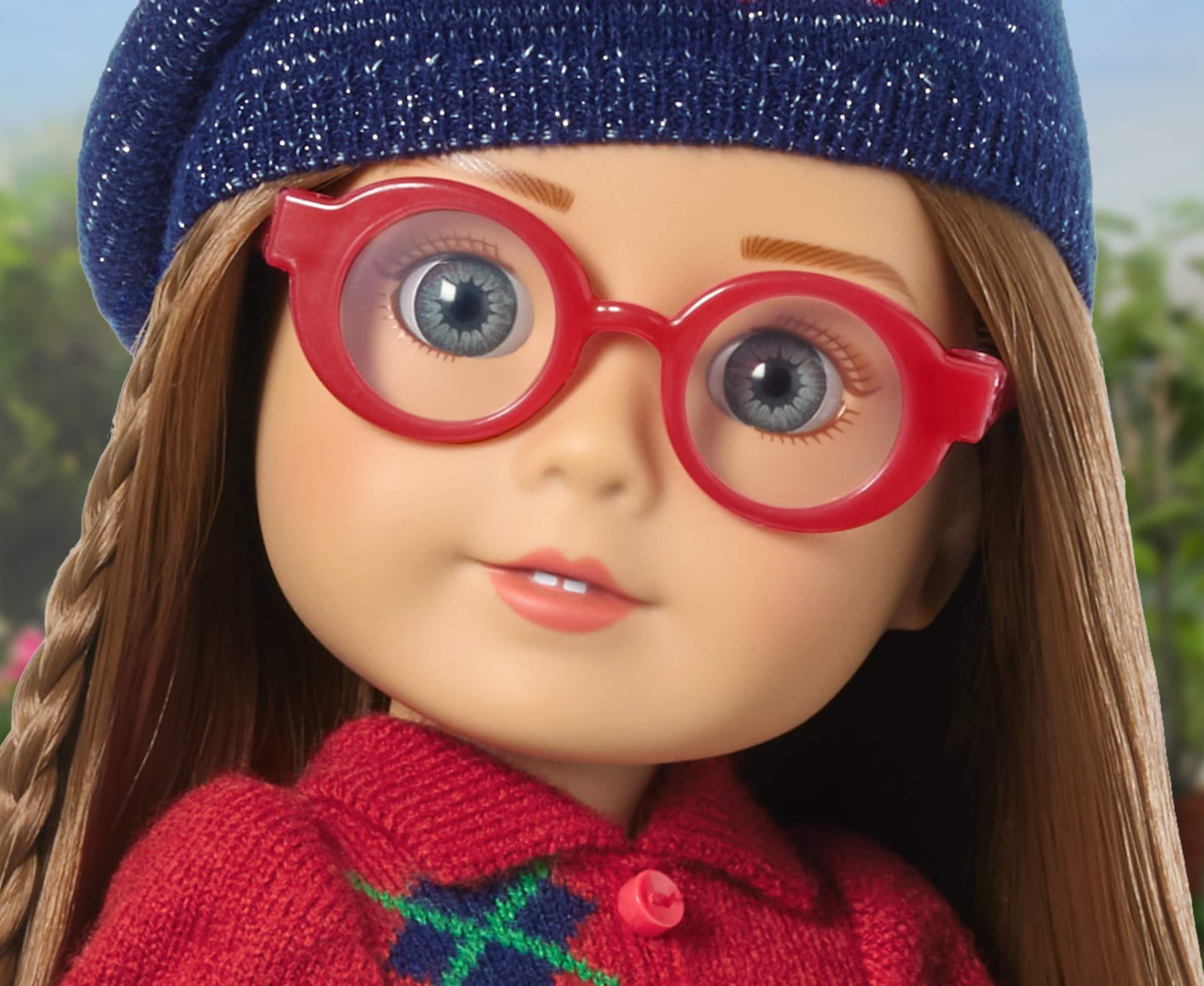 Close up image of Modern Era American Girl doll, Molly, smiling