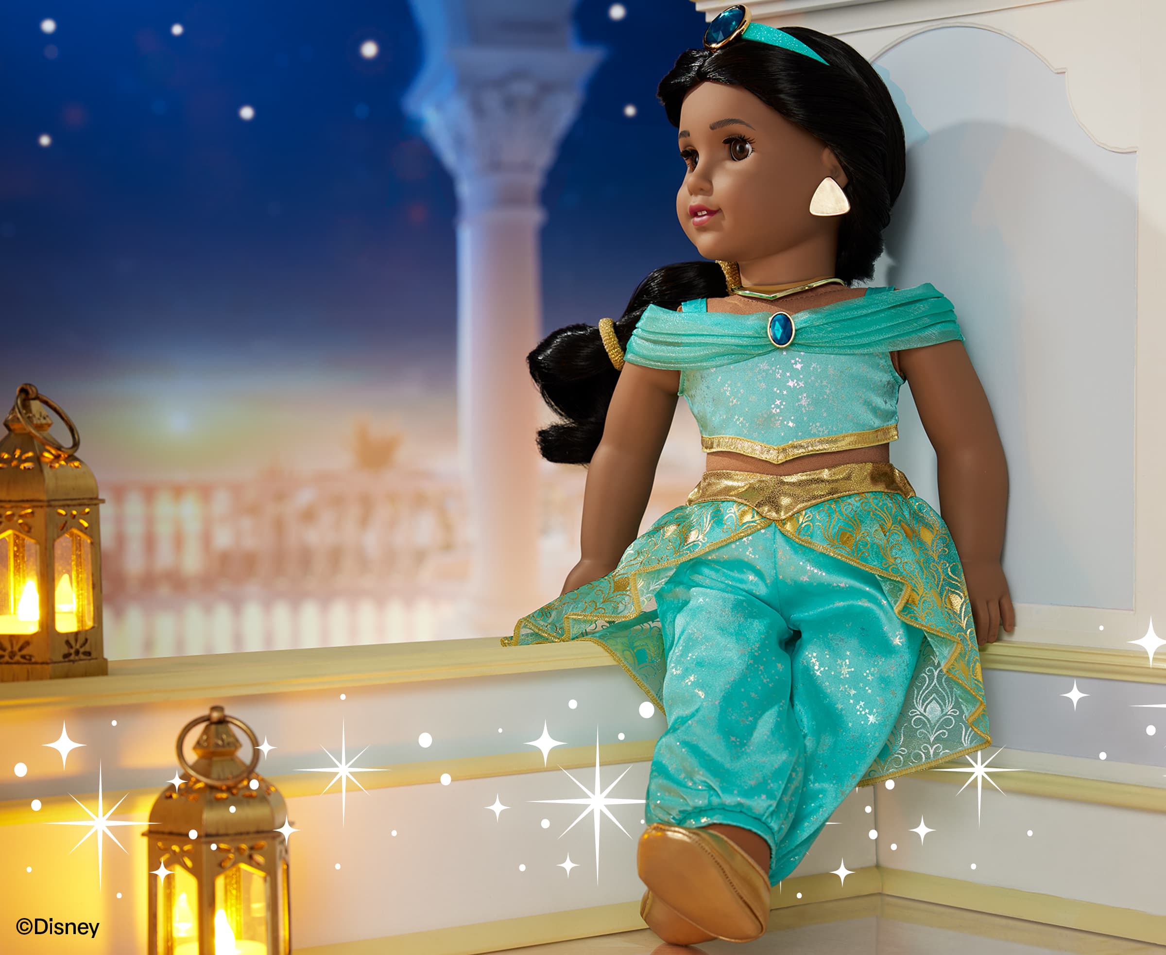 Image of Jasmine American Girl doll showing her whole turquoise outfit and a starry night background