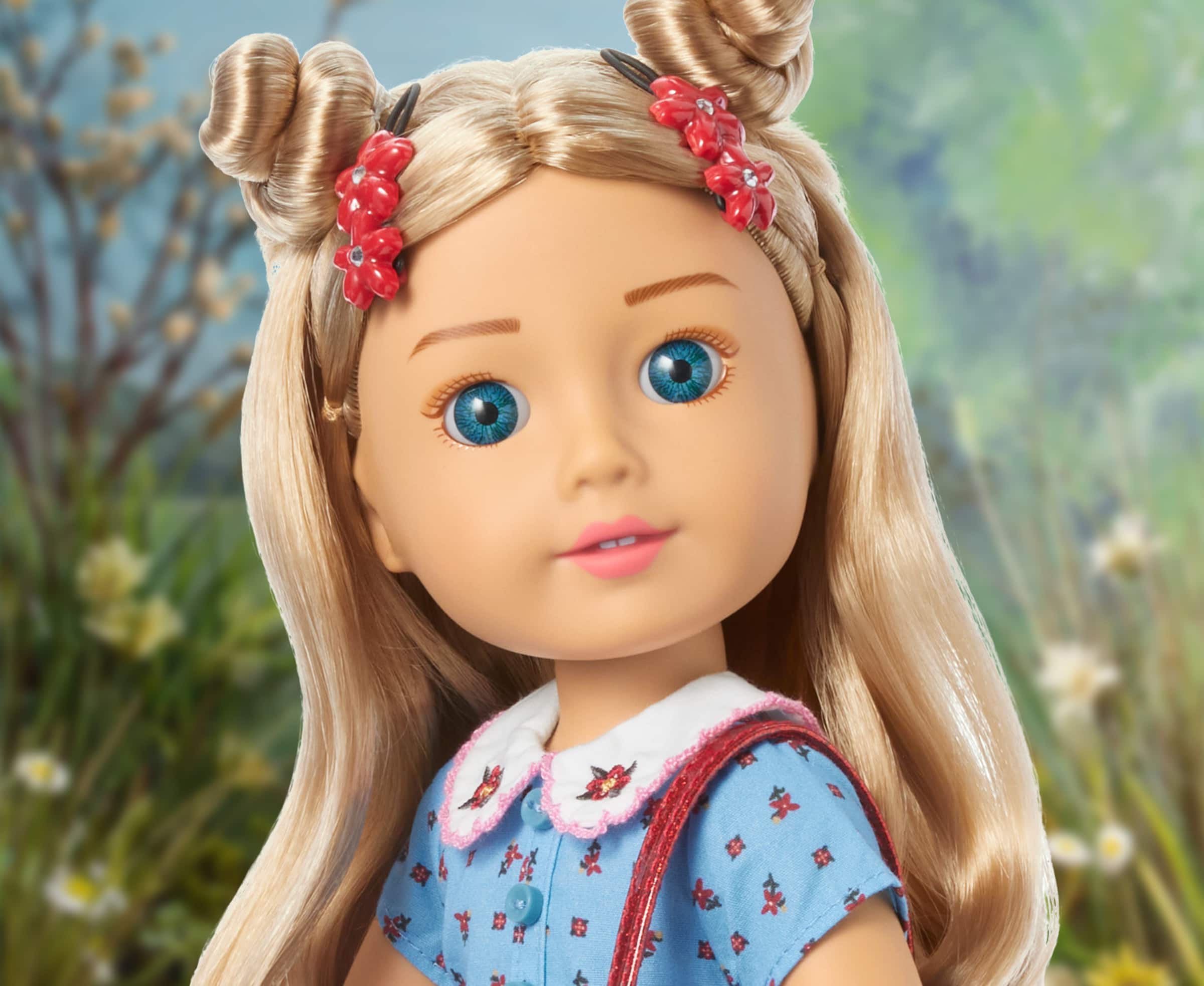 Close up image of Modern Era American Girl doll, Kirsten, smiling