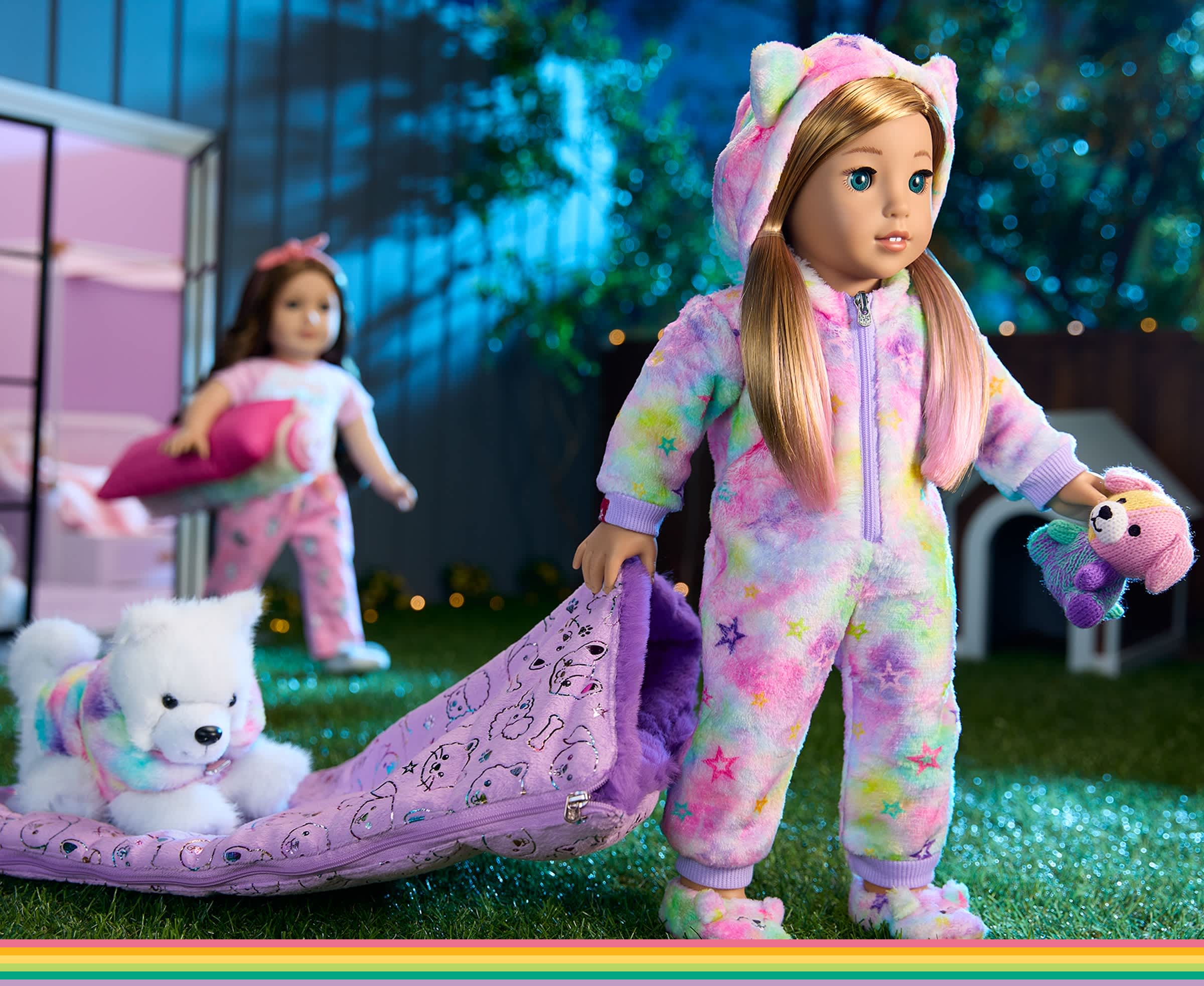 Summer McKinny holding her sleeping bag in the backyard