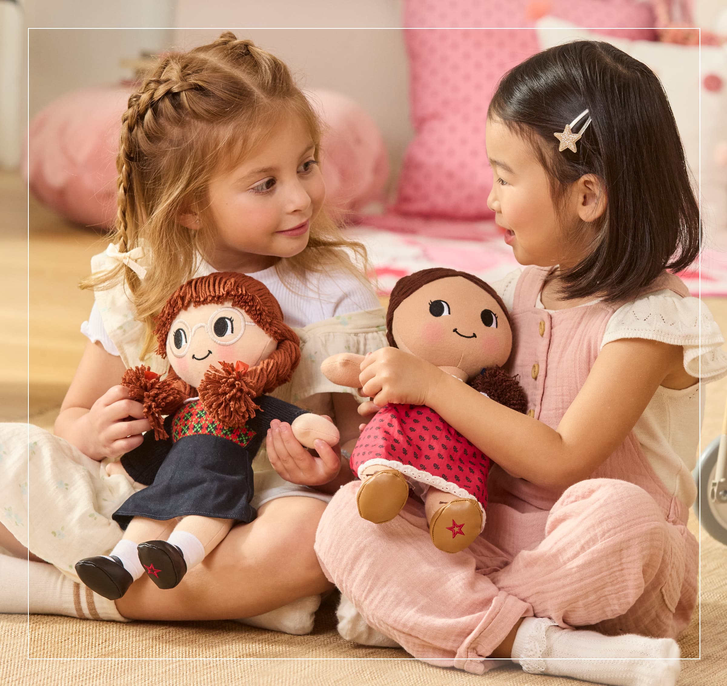 Girl holding Molly McIntire plush doll