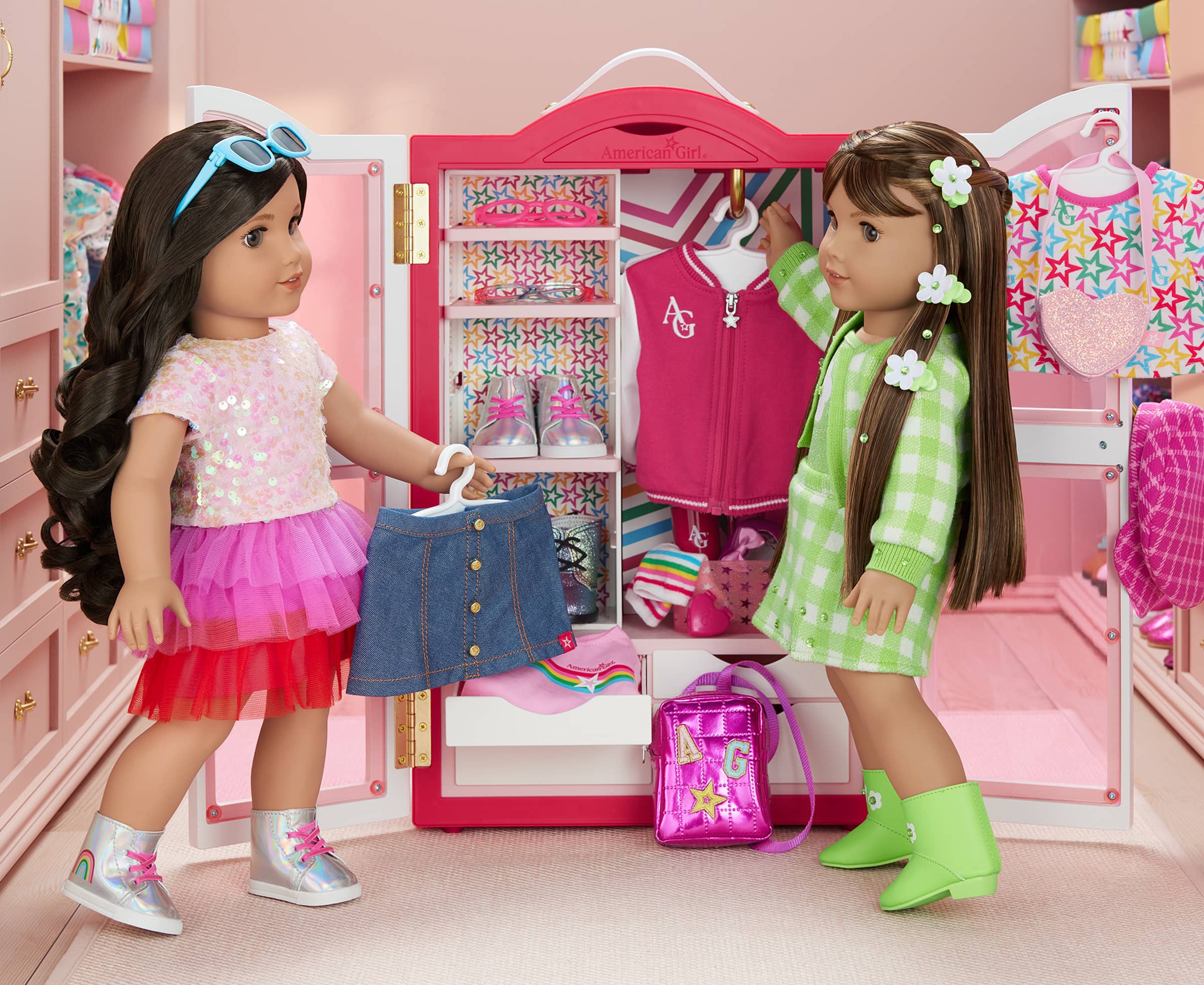 Dolls picking clothes out of AG Star Closet