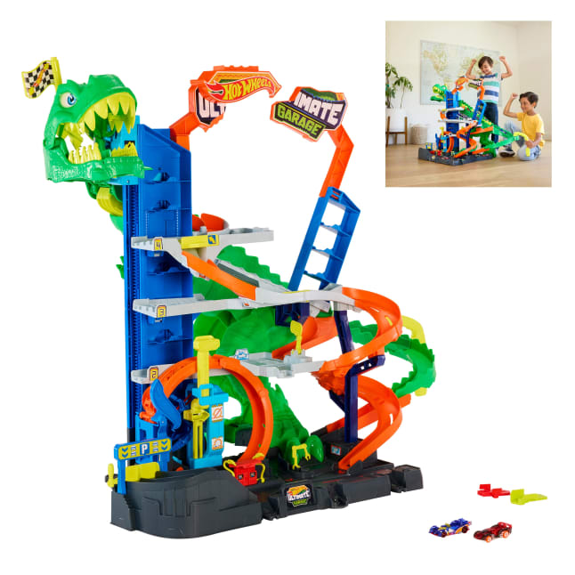 Hot Wheels City Απόλυτο Γκαράζ T-Rex Με 2 Αυτοκινητάκια & Αποθήκευση Για 50+, Αγώνες & Κόλπα, Αντίπαλος Δεινόσαυρος - Bild 1 von 