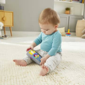 La Télécommande De Puppy Fisher-Price Rires & Éveil