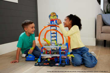 Hot Wheels MEGA Loop Garage Playset With 1 Die-Cast Toy Car & 1 Toy Helicopter in 1:64 Scale