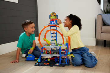 Hot Wheels MEGA Loop Garage Playset With 1 Die-Cast Toy Car & 1 Toy Helicopter in 1:64 Scale