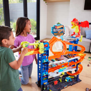 Hot Wheels City MEGA Garage Playset Con 2 Macchinine Die-Cast, Box Per Riporre Oltre 50 Macchinine